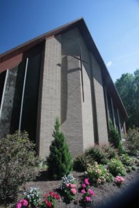 Lakeview’s lovely summer gardens in front of sanctuary